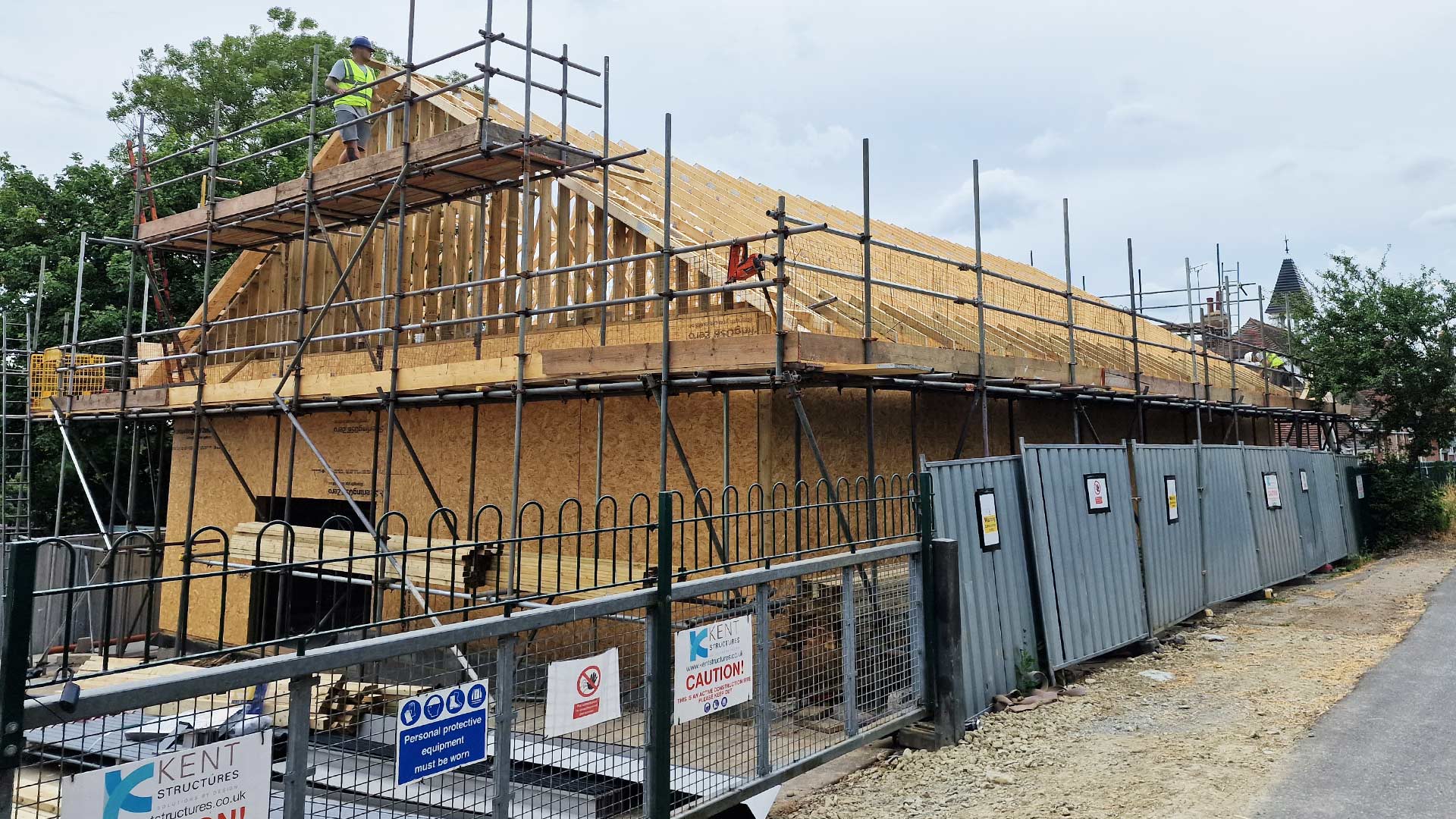 Timber frame school hall under construction for Mersham Primary in Kent.