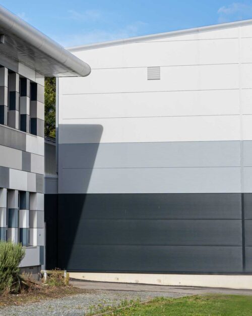 Featured image of Sports Hall building with school crest detail