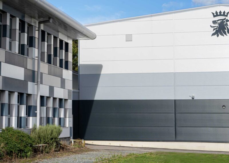 Featured image of Sports Hall building with school crest detail