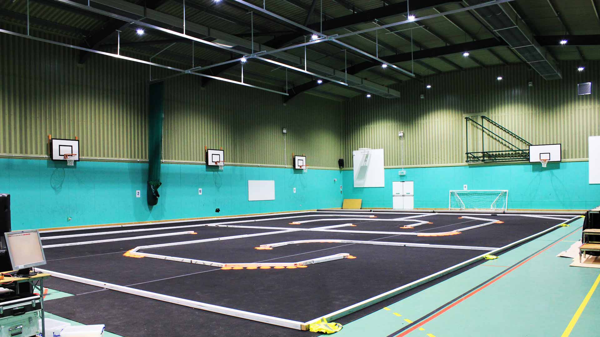 Interior of Robertsbridge Community College steel frame sports hall in Sussex.